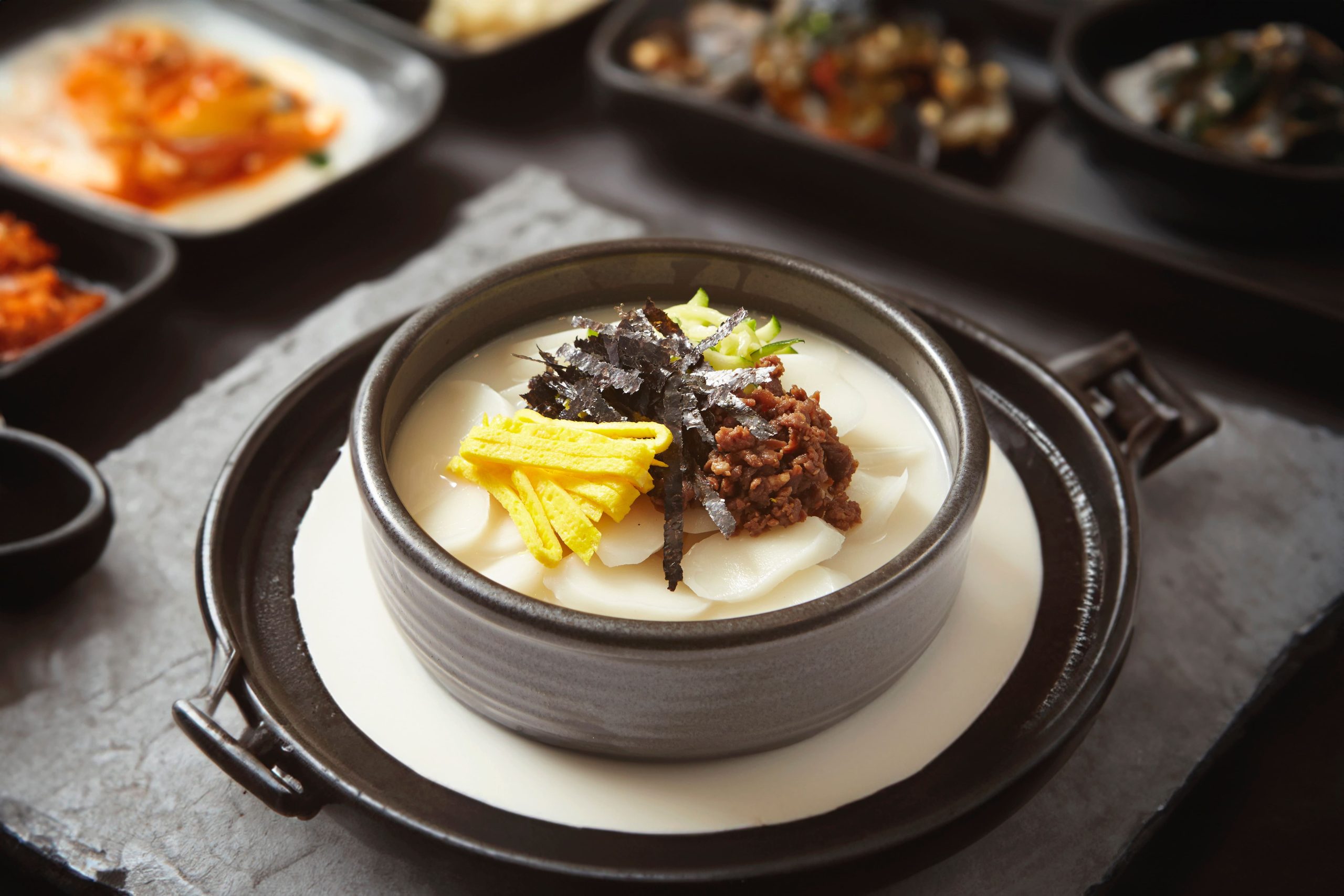 tteokguk, rice-cake soup prepared with slices of rice cake, beef, eggs, etc.