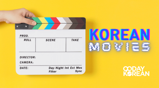 A hand holding a clapperboard and a text that says Korean Movies