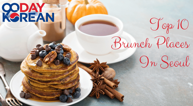 Delicious brunch with blueberry pancakes and tea on a grey table