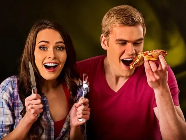 Couple eating fast food