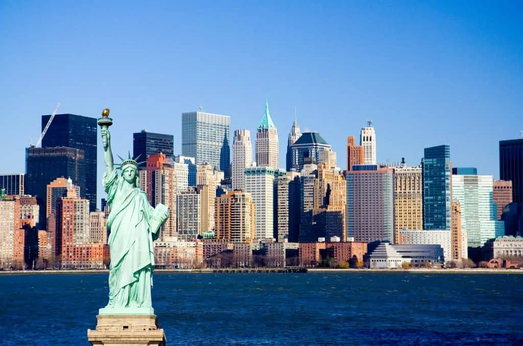 View of the skyline of New York City with the Statue of Liberty up front