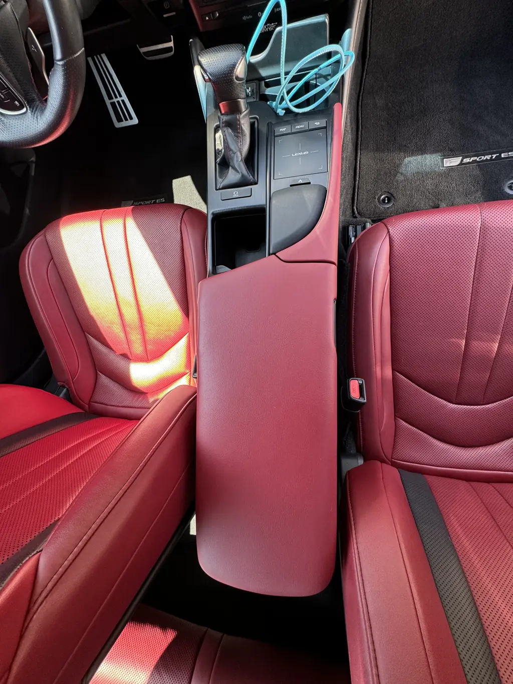 Freshly detailed red leather interior of a Lexus ES F Sport in La Mesa CA