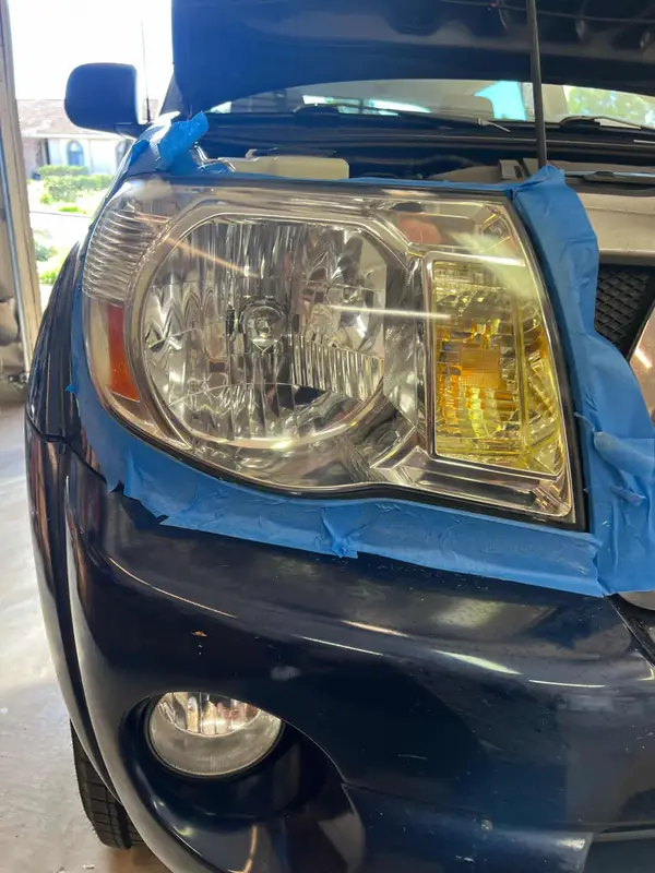 Restored headlight with protective finish applied