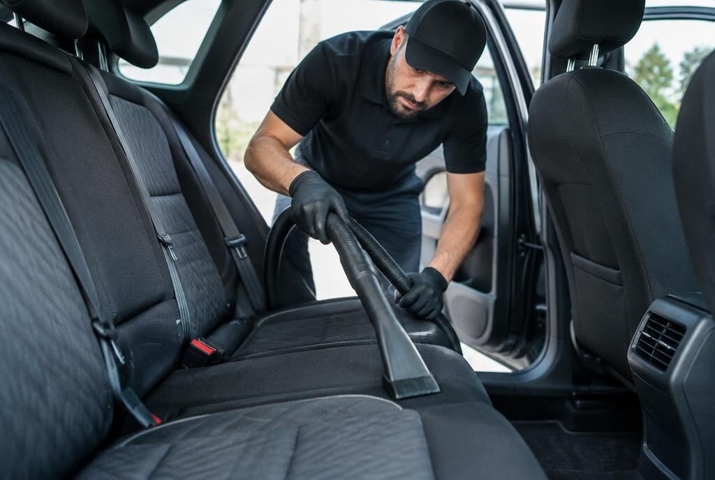 Technician detailing a car in Mission Beach