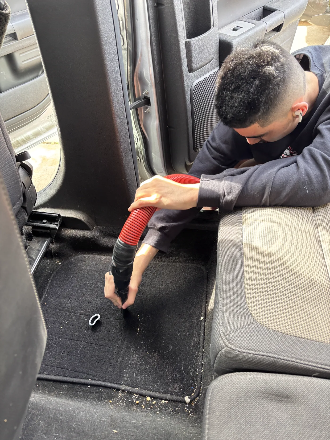 Interior vacuuming during a mobile detail