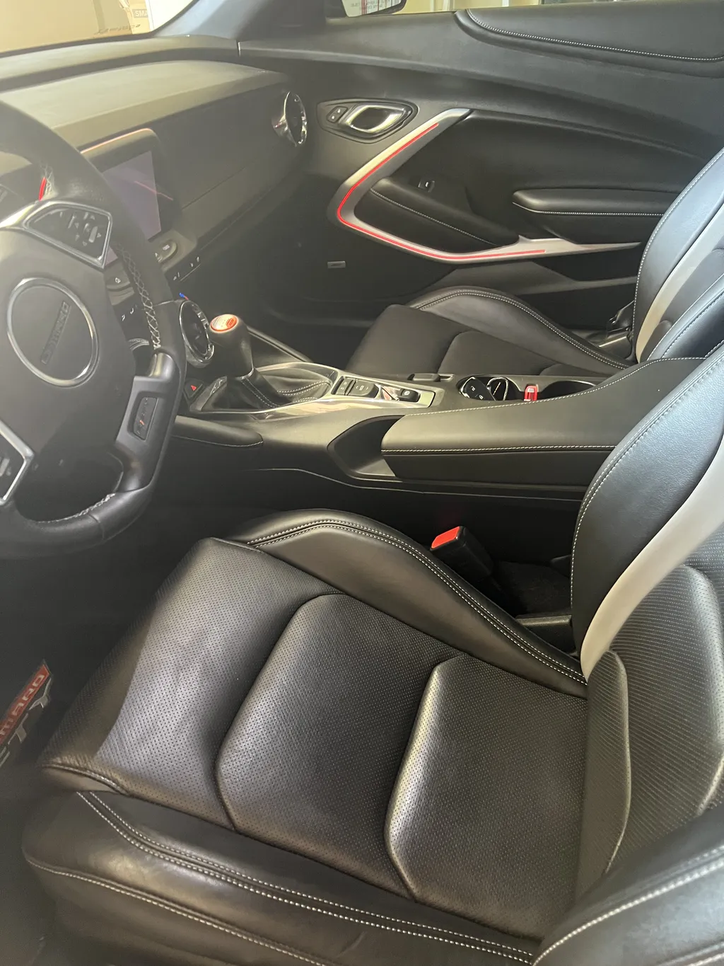 Technician detailing a car in Downtown San Diego